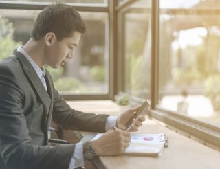 Businessman looking at stats